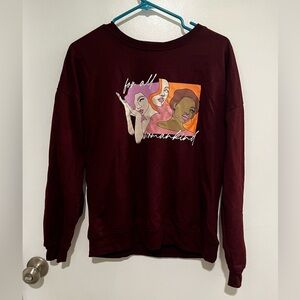 Women’s maroon sweater.